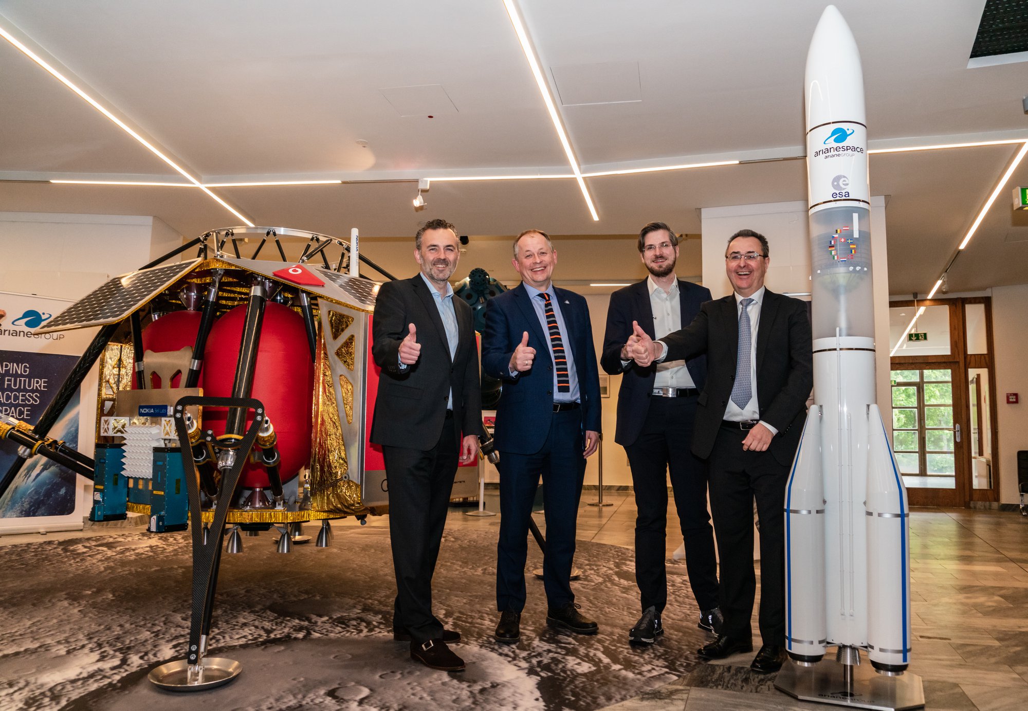 left to right, Thomas Jarzombeck, Federal Government Coordinator of Germany;
David Parker, ESA Director of Human & Robotic Exploration;
Robert Böhme,CEO PTScientists GmbH;
Pierre Godart, CFO Ariane Group; Credits: PTScientists