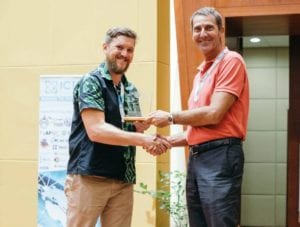 Matteo Catanuto accepts Best Digital Inclusion Award on behalf of Kacific