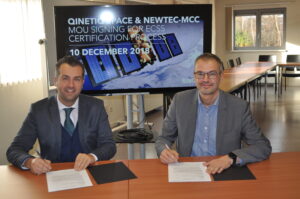 Thomas Van den Driessche, CEO, Newtec and Erik Masure, Managing Director, QinetiQ Space Belgium sign an MoU for ECCS Certification process