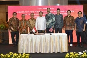 Pictured, left to right, at a signing ceremony in Jakarta, Indonesia: Mr. Timotius Sulaeman, PT. Dian Semesta Sentosa; Mr. Adi Rahman Adiwoso, PT. PSN; Mr. Erry Riana Hardjapamekas, PT. PSN; Mr. Rudiantara, Minister of Communication & Information Technology; Mr. Ramesh Ramaswamy, Hughes; Mr. Vaibhav Magow, Hughes; Mr. Arif Medianto, PT. Pintar Nusantara Sejahtera; and Mr. Adi Widjonarko, PT. Nusantara Satelit Sejahtera.