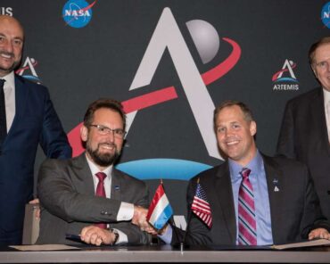 Dr. Marc Serres (second left), CEO of the Luxembourg Space Agency, shakes hands with Jim Bridenstine (second right), Administrator of NASA. Photograph courtesy of the Luxembourg Space Agency.