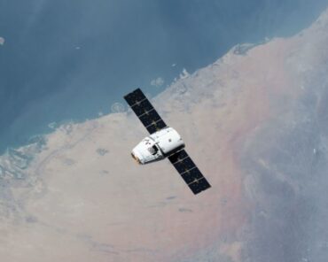 Picture of SpaceX Dragon Capsule flying over UAE carrying palm tree seeds for an experiment on ISS by UAE Astronaut Hazzah Al Mansoori