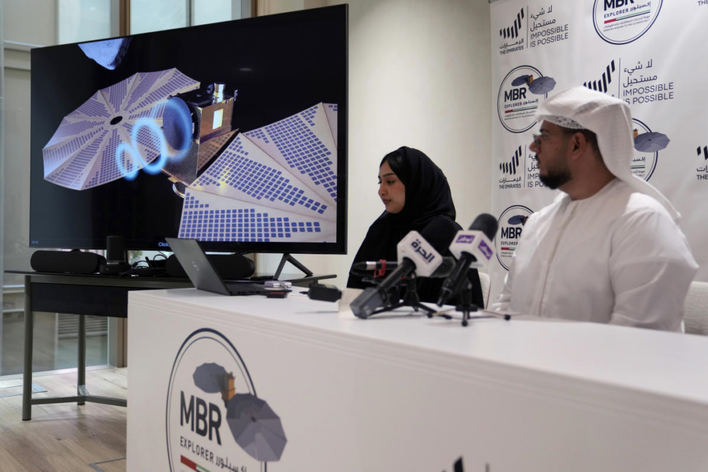 Mohsen Al Awadhi, Director of UAE Space Missions Department, 1st right, and Hoor AlMaazmi UAE, space science researcher, take part at a press conference revealing the latest news about the Emirates Mission to the Asteroid Belt, in Dubai, Monday, May 29, 2023. Credit UAE Space Agency 