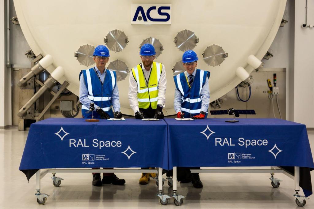 Ian Annett, Deputy CEO UK Space Agency, Matt Fletcher Head of Environmental Test at STFC RAL Space, and Richard Budd, Head of Secure Communications UK, US & Australia, Airbus Defence and Space, at the signing ceremony for SKYNET 6A testing. Credit: STFC RAL Space