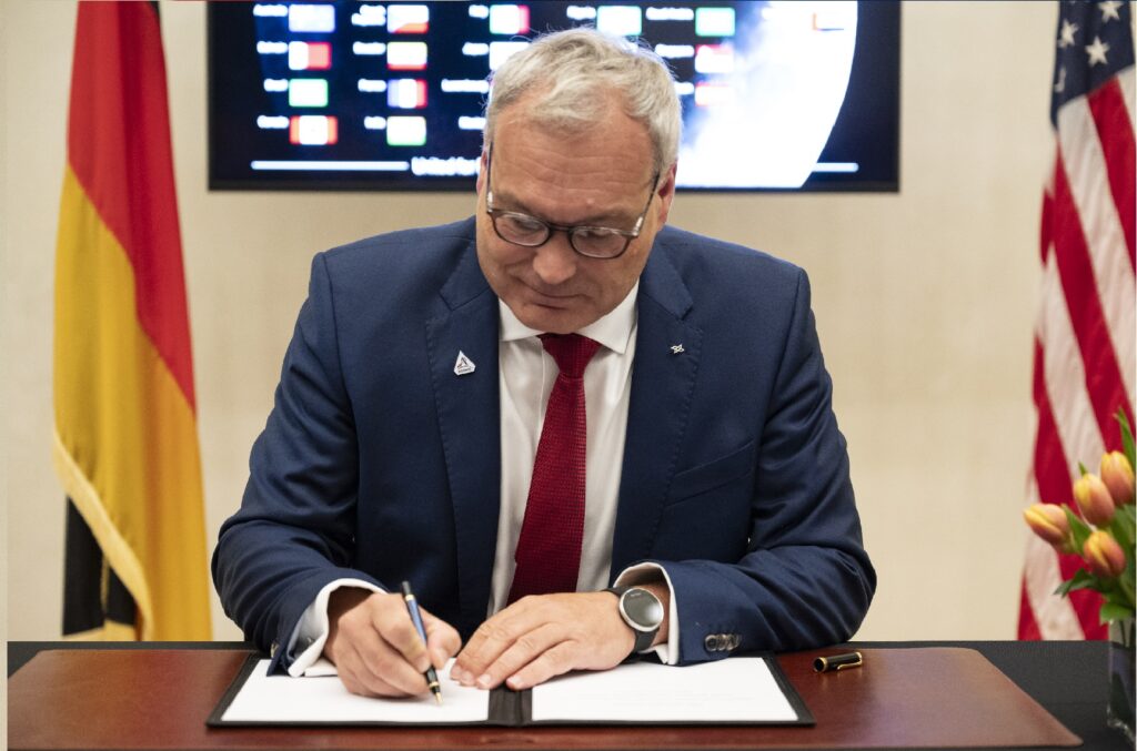 Director General of the German Space Agency at the German Aerospace Center (DLR) Walther Pelzer signs the Artemis Accords, Thursday, September 14, 2023, at the German Ambassador’s Residence in Washington. Credit: NASA/Keegan Barber
