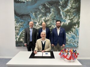 From left to right, Holger Krag, Head of the Space Safety Programme Office at ESA, Rolf Densing, Director of Operations, ESA and Quentin Verspeisen, Space Safety Programme and Protect Accelerator Coordinator, ESA. Signing is Lorenzo Arona, SDA Standard Member Director and Head of Space - Projects and Products, Avanti Communications.