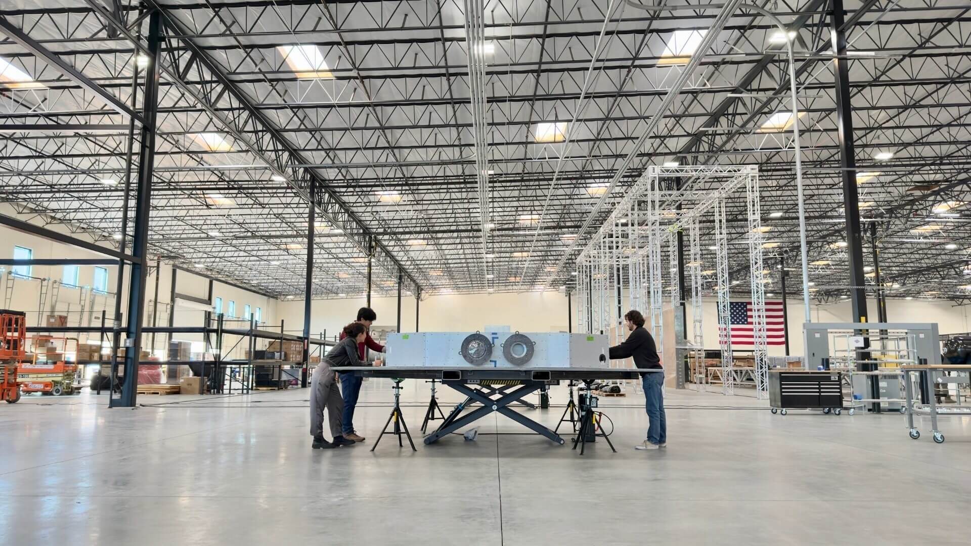 K2 Space engineers prepare a high-power satellite for testing at the company's recently opened Torrance manufacturing facility, where the team will scale production following its $110M Series B raise.