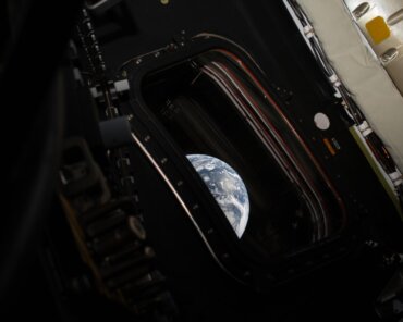 A view of Earth taken by NASA astronaut and Artemis II commander Reid Wiseman from one of the Orion spacecraft’s four main windows after completing the translunar injection burn on April 2, 2026. Credits: NASA
