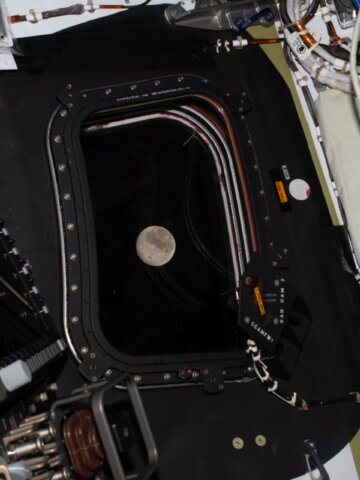 Before going to sleep on flight day 5, the Artemis II crew snapped one more photo of the Moon, as it drew close in the window of the Orion spacecraft. Image: NASA