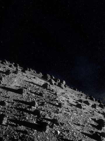 ESA's Hera mission for planetary defence seen approaching the boulder-strewn Dimorphos asteroid. On 26 September 2022 NASA’s approximately half-tonne DART spacecraft impacted the boulder covered Dimorphos asteroid at a speed of 6.1 km/s. Credit: ESA-Science Office