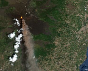 On 5 July 2026, the Copernicus Sentinel-2 mission captured this image of Mount Etna spewing lava and a massive plume of ash, gas and rock into the sky over the Italian island of Sicily.  Credit: ESA