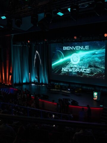 The stage at the 2026 Assises du NewSpace in Paris, where more than 1,000 participants and 135 speakers gathered to discuss the future of France's NewSpace ecosystem, European competitiveness, and the growing role of private investment. Credit: Les Assises du NewSpace