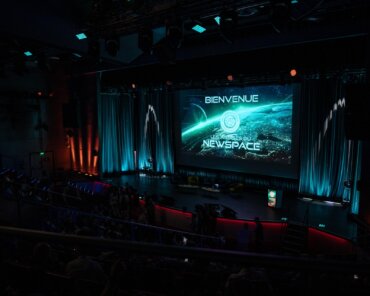 The stage at the 2026 Assises du NewSpace in Paris, where more than 1,000 participants and 135 speakers gathered to discuss the future of France's NewSpace ecosystem, European competitiveness, and the growing role of private investment. Credit: Les Assises du NewSpace