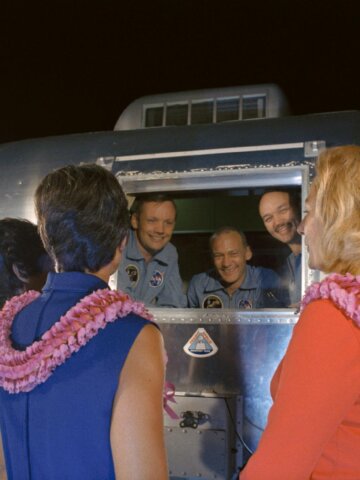 Often invisible, but always there supporting, before and after a successful mission. The Apollo 11 crewmen, still under a 21-day quarantine, are greeted by their wives. Credit: NASA