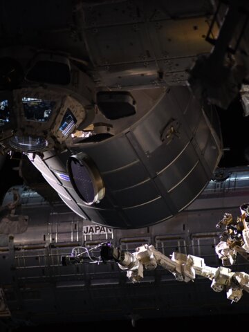 View of Japan's KIBO Laboratory on the ISS, Canadarm in the front. Credit: ESA/NASA–T. Pesquet
